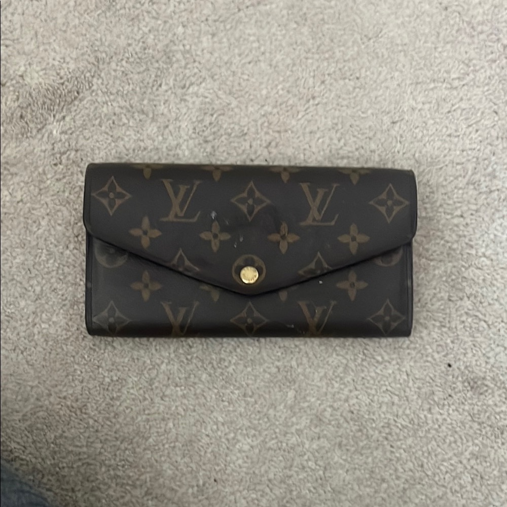 Louis Vuitton Brown Quilted Wallet with Gold Accents